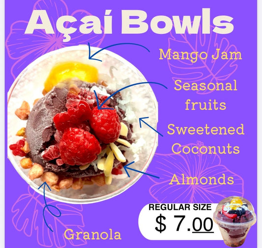 Acai_bowl_with_mango_jam_seasonal_fruits_coconuts_almonds_granola